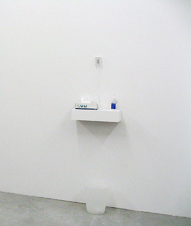 Installation, mixed media: ipod shuffle with soundcollage, earphones, packaging,<br> handsanitizer, papertowel dispenser, trash can 